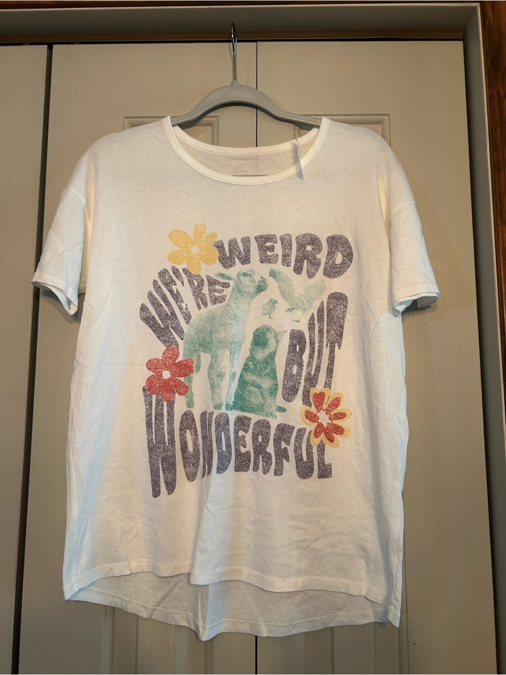 Women’s white  Graphic Tee - "We're Weird But Wonderful"